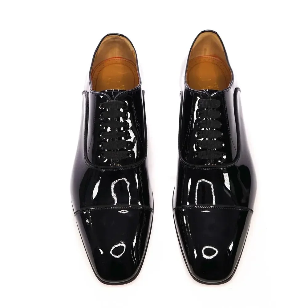 $1,295 LOUBOUTIN - Black Patent 